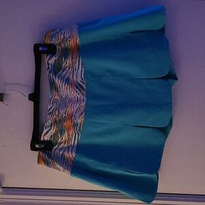Turquoise/teal scalloped Fila skorts like new
